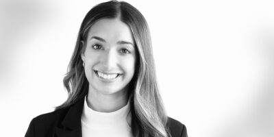 Black and white headshot of business attorney Megan Broussard